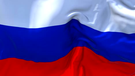 russia flag waving in wind slow motion animation . 4k realistic fabric texture flag smooth blowing on a windy day continuous seamless loop background.