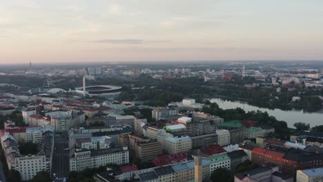 aerial hover over helsinki with stadium and colorful buildings