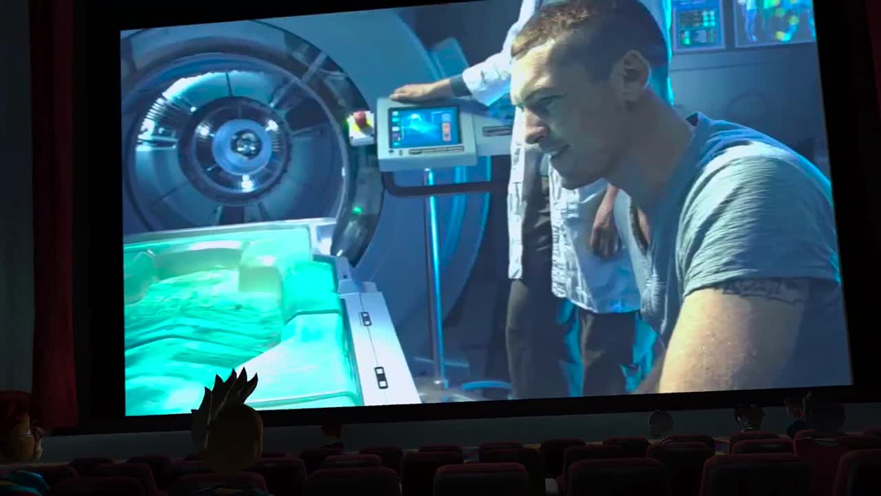 Friends in virtual glasses watching movies in the cinema with special effects. Into metaverse. BIGSCREEN