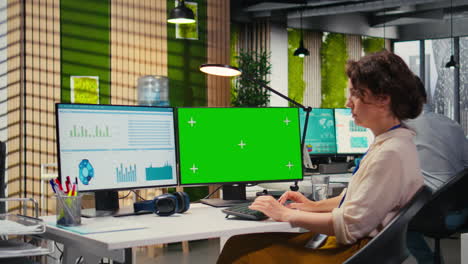 vertical video executive assistant analyzing kpi metrics on computer monitor with mockup