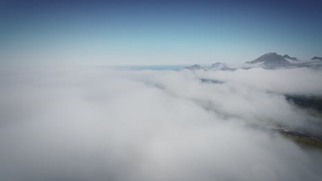 Cinematic-FPV-drone-shot-stabilized-from-lofoten-revealing-mountains-from-behind-the-clouds