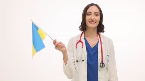 Female Doctor Holding Ukrainian Flag