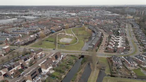 Jib-up-of-beautiful-suburban-neighbourhood-with-a-large-green-park