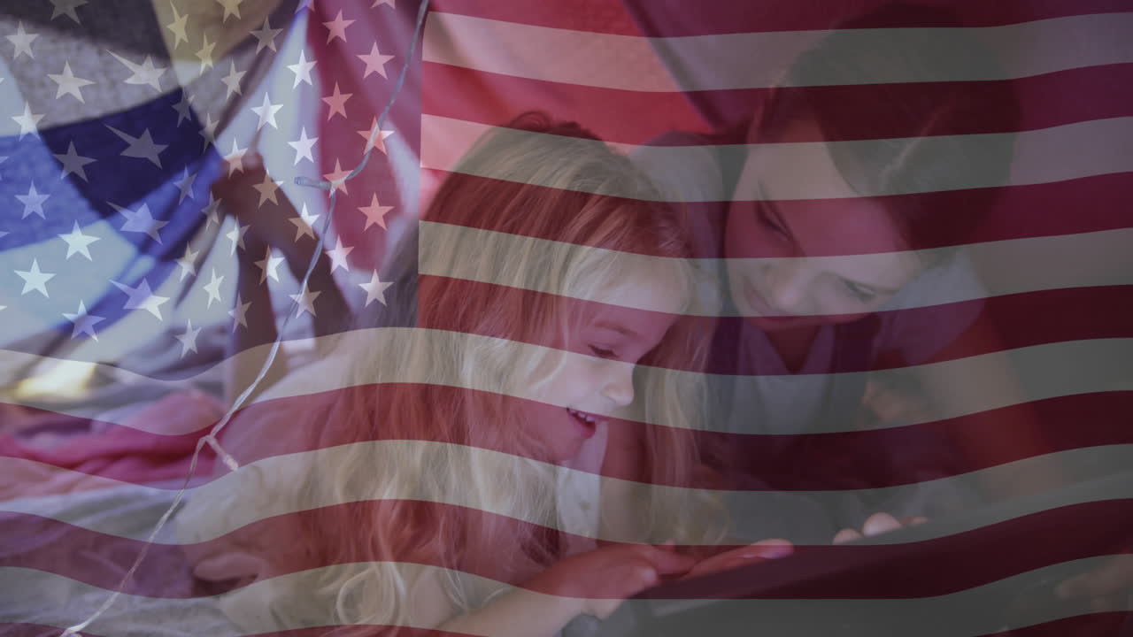 Under American flag animation, children playing on tablet in school environment