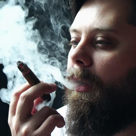 man holding a cigar