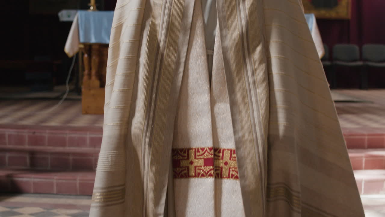 Images of a priest in clerical clothing