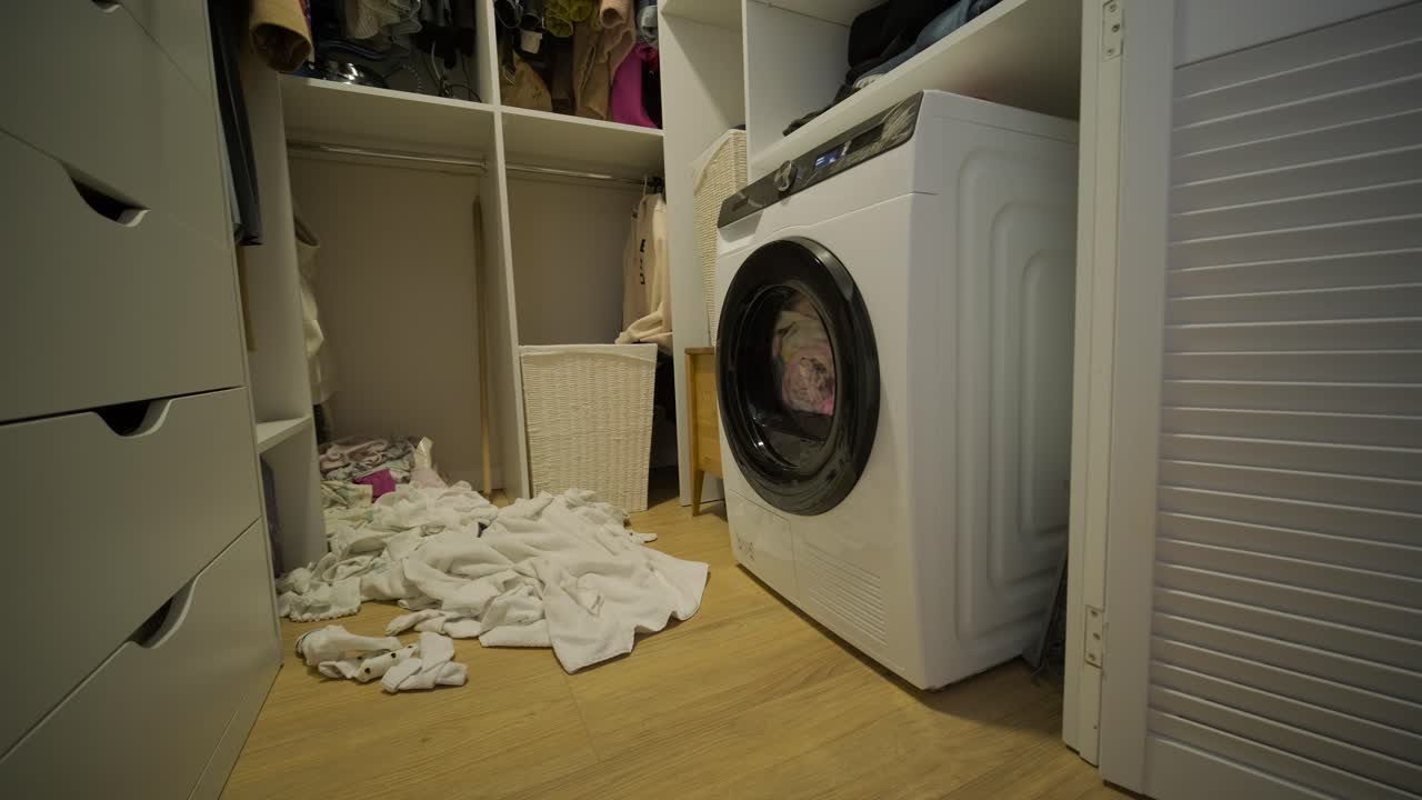 Modern Washing Machine Drying Clothes in a Home Laundry Room