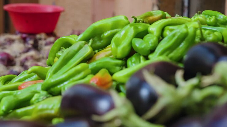 Green Bell Peppers Among Other Vegetables At Ghardaia Market In Algeria