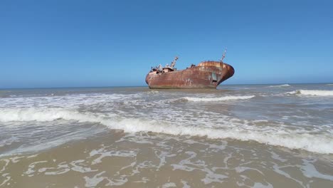 abandoned fishing boat after it ran aground and crashed on the shores