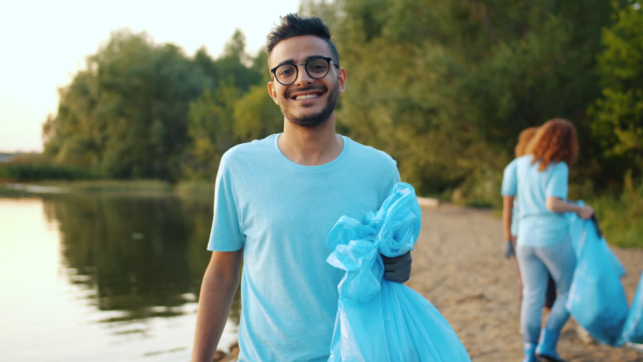 Community Volunteers Cleaning Up a Riverbank
