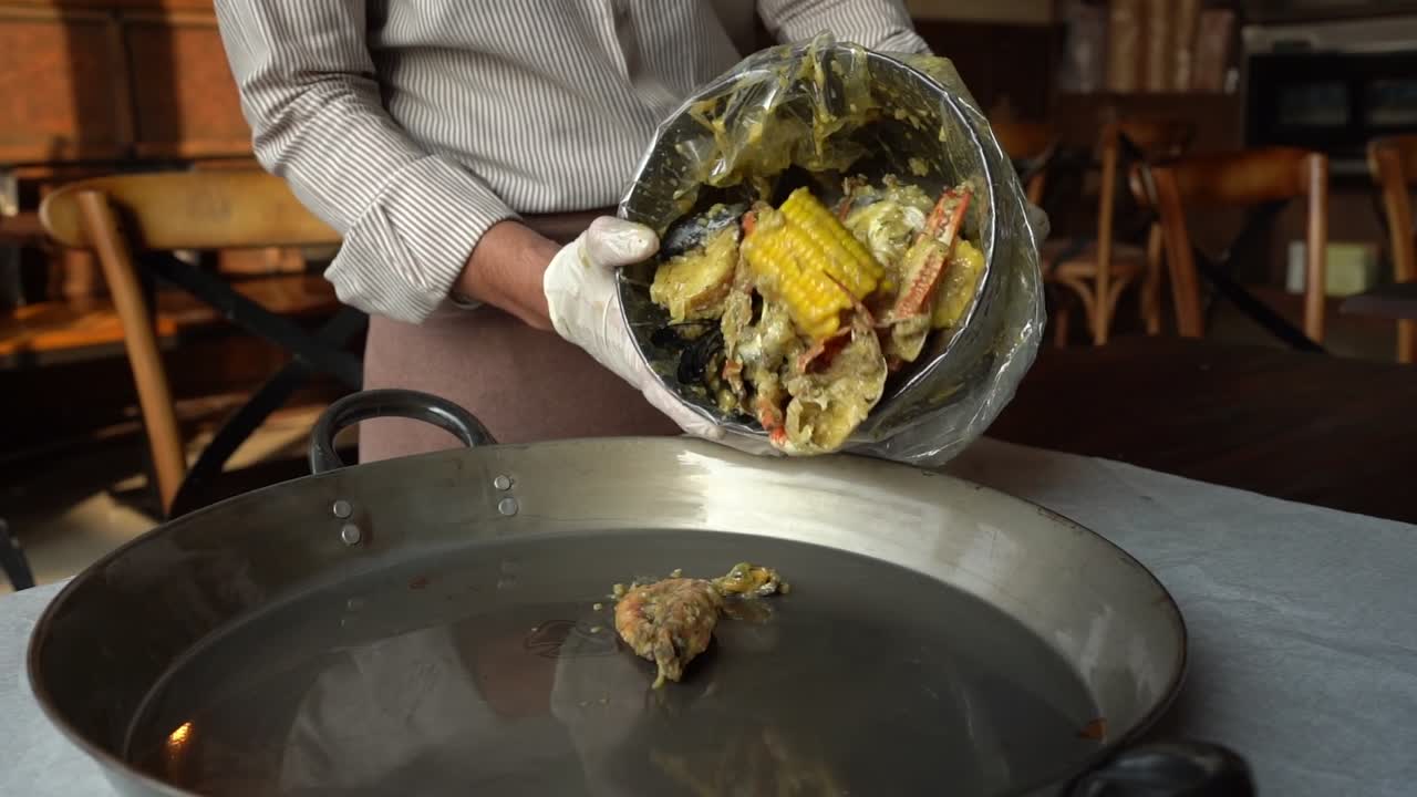 A chief prepares delicious food in fancy restaurant, close up shot, high angle shot