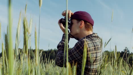 photographer in a wheat field