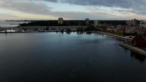 flying along the shore of lake ontario at sunrise on a summer morning