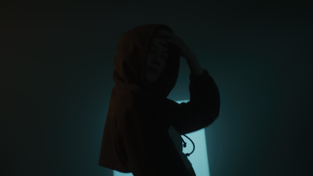 Woman in Hoodie Silhouette