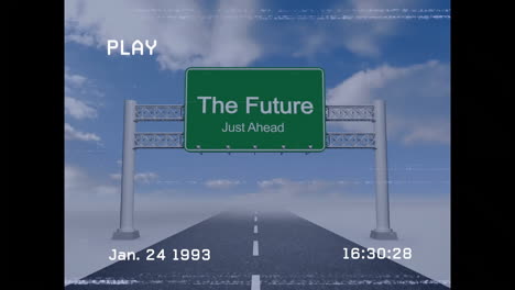 highway sign with future just ahead message over road under cloudy sky