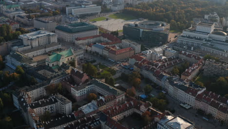 High-angle-view-of-palaces-in-old-town-district.-Tilt-up-reveal-of-park-and-modern-high-rise-office-buildings-in-city-centre.-Warsaw,-Poland