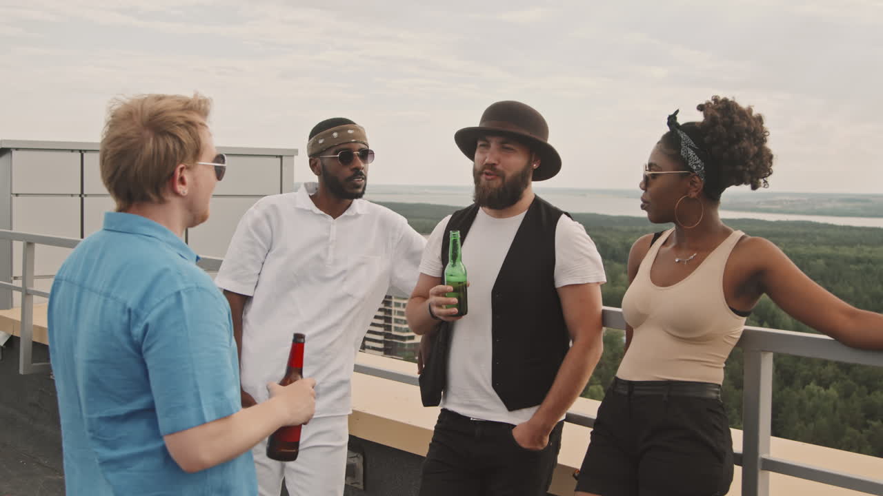 Friends Having Conversation on Rooftop Terrace