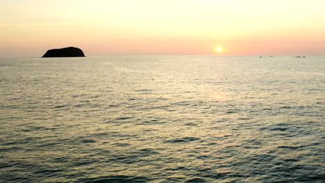 Panorama-shot-of-a-beautiful-ocean-sunset-with-drone