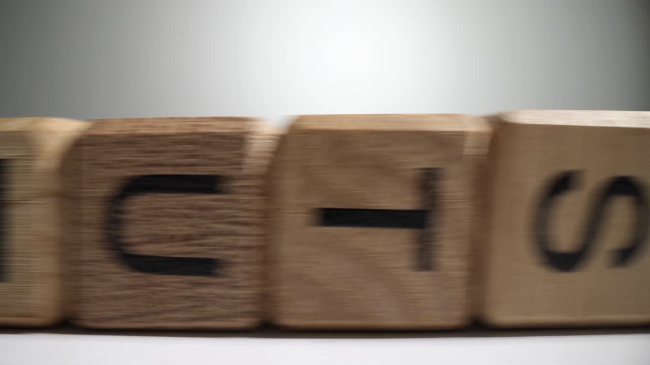 Abstract Depiction of Typing and Data Processing with Spinning Wooden Blocks