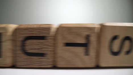 abstract depiction of typing and data processing with spinning wooden blocks