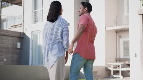 Couple,-back-and-hug-outdoor-at-new-home