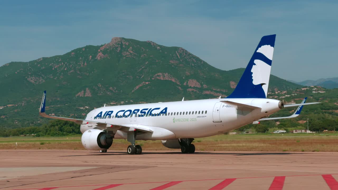 Air Corsica A320 Neo is on the Airport in Ajaccio, Corsica - Tracking Shot
