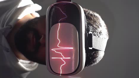 Young-doctor-review-medical-heartbeat-lines-on-VR-glasses,-hologram-overlay