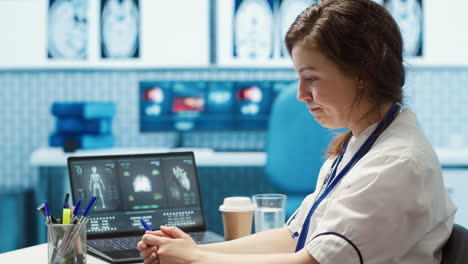 medical staff reviewing diagnostic reports and results for a patient