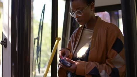 Female-commuter-getting-out-from-bus-4k