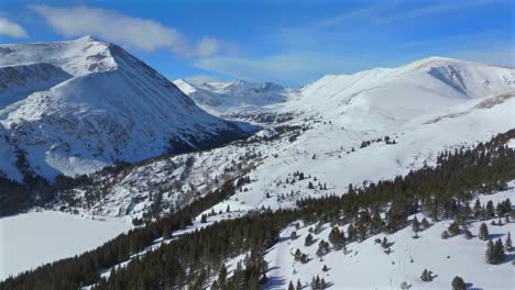 hoosier pass winter wilderness ski backcountry trails breckenridge colorado aerial drone quandary peak alma fairplay blue river rocky mountains morning blue sky 14er december january forward motion
