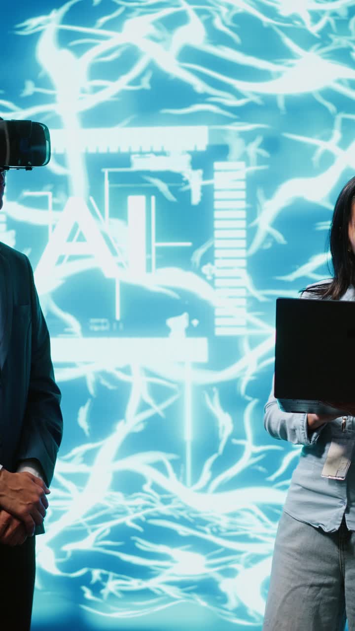 Vertical video Team of programmers interacting with AI visualization using VR