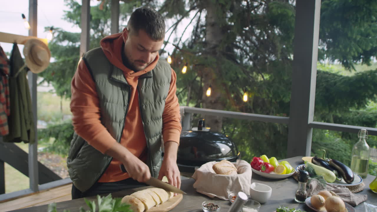 Food Blogger Cutting Bread and Speaking on Camera