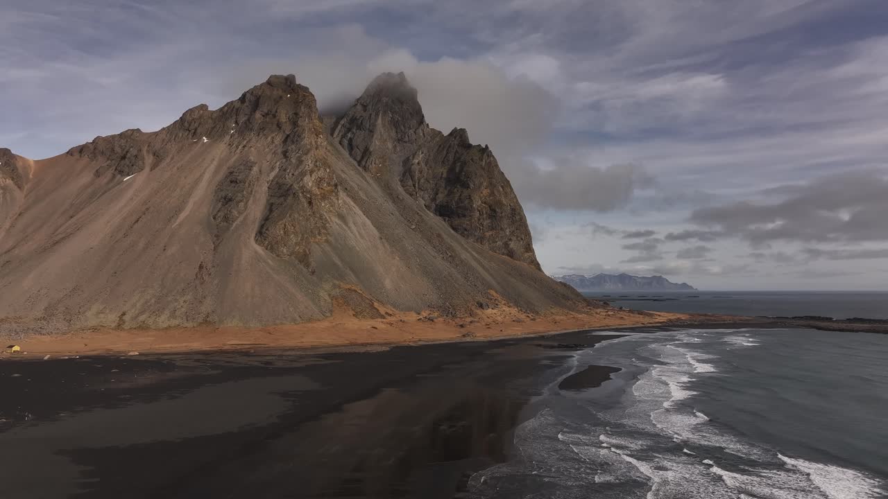 Aerial view of the coast of Iceland. The magnificent 'Horny' Mountains rising steeply towards the sea