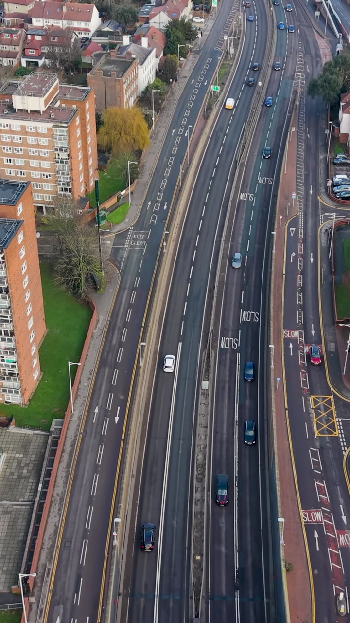 Vertical drone flyover A12 George Green Tunnel following Traffic
