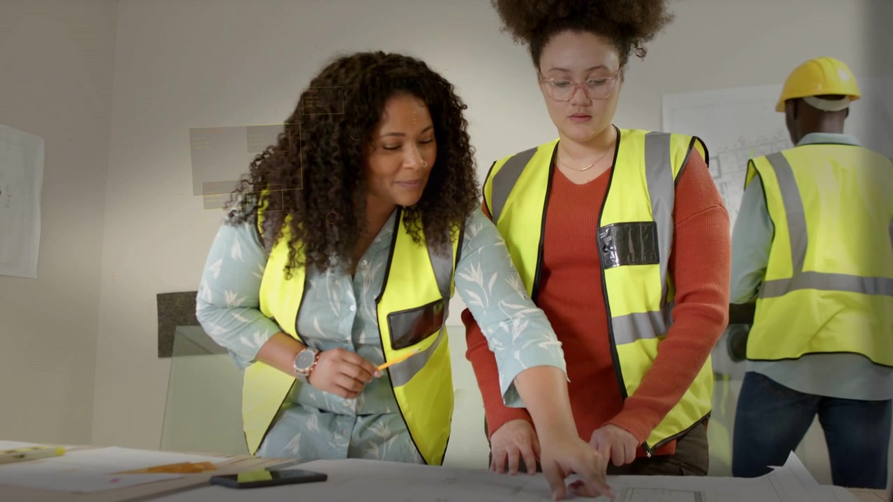 Lead woman pointing pencil urging peer tracing site plans and confirming plan while worker checking
