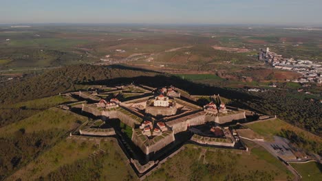 establishing shot of the fort of nossa senhora da graça catching the evening light