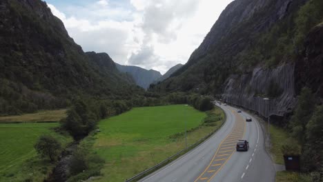 Illustration-of-travel-and-traffic-in-Norway---Static-overview-of-Road-E16-with-passing-cars---Road-between-east-and-west-Norway---Dalekvam-outside-Bergen