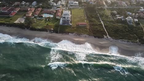 drone footage of a beautiful beach over the coast of brazil