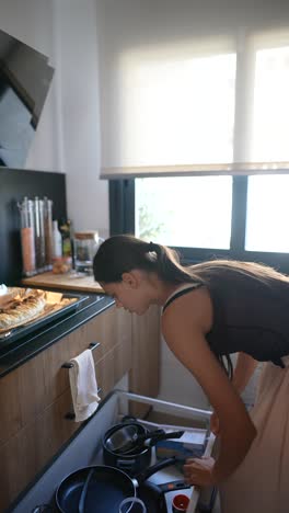 woman preparing food in a modern kitchen