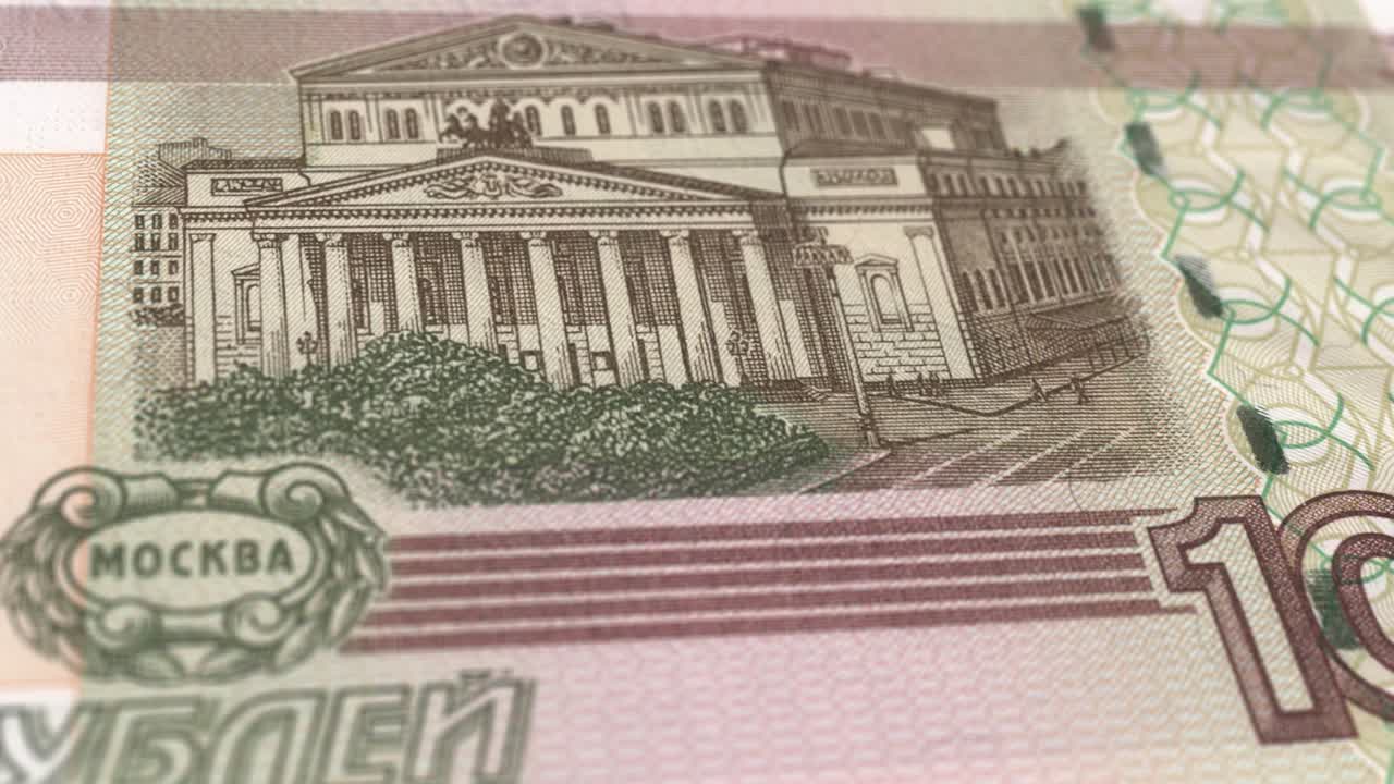 100 Russian Ruble - the National Currency of Russia - Extreme Detail of Russian Ruble Russian Currency - 100 ₽ Russian Ruble - Printing Money - 4K - Russian Federation Currency stock video - Obverse of 100 russian rubles