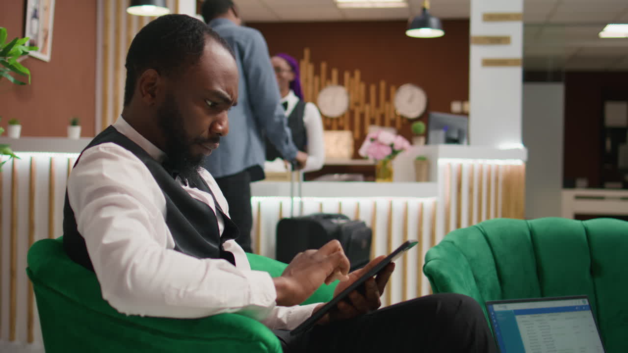 African american staff making bookings