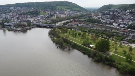 aerial cityscape of bingen am rhein with train on nahe railway bridge, germany