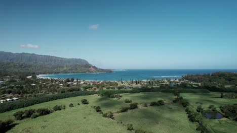 Mountains-and-tropical-beaches,-Hanalei-Bay-and-Princeville,-north-shore-Kauai,-aerial-panorama