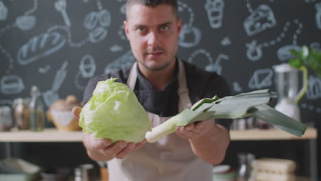 chef demonstrating lettuce and leek preparation