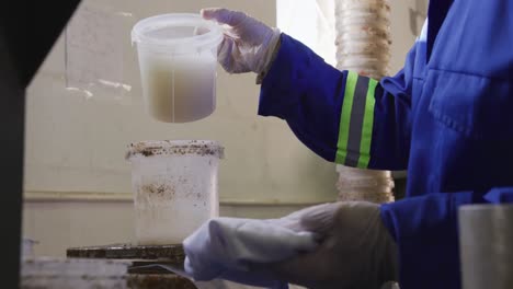 mixed race man working in factory