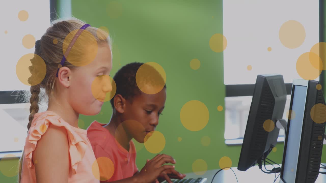Animation of glowing spots of yellow light over diverse school children in classroom