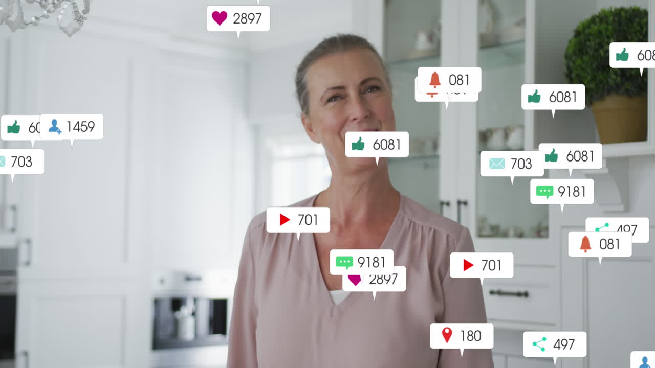 Animation of social media icons over caucasian senior woman smiling at home