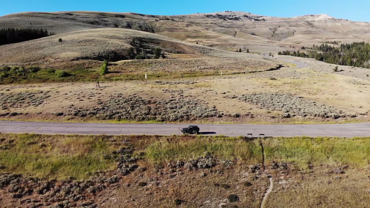 Off-road vehicle on a mountain road