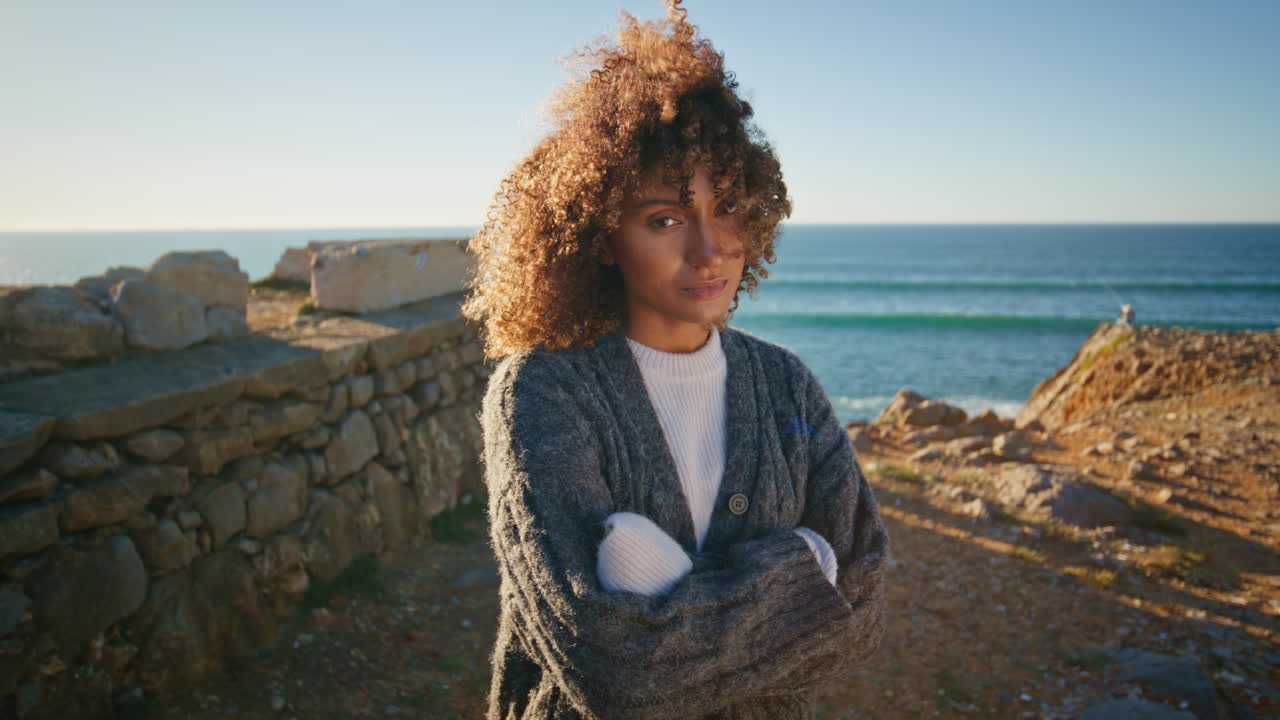Sensual woman posing ocean enjoying sea nature portrait. Model looking camera