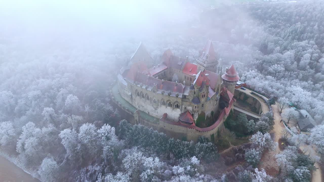 Burg Kreuzenstein On Misty Winter In Leobendorf, Austria - Aerial Drone Shot